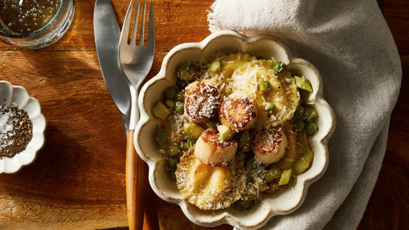 Cacio e Pepe Ravioli with Seared Scallops and Greens